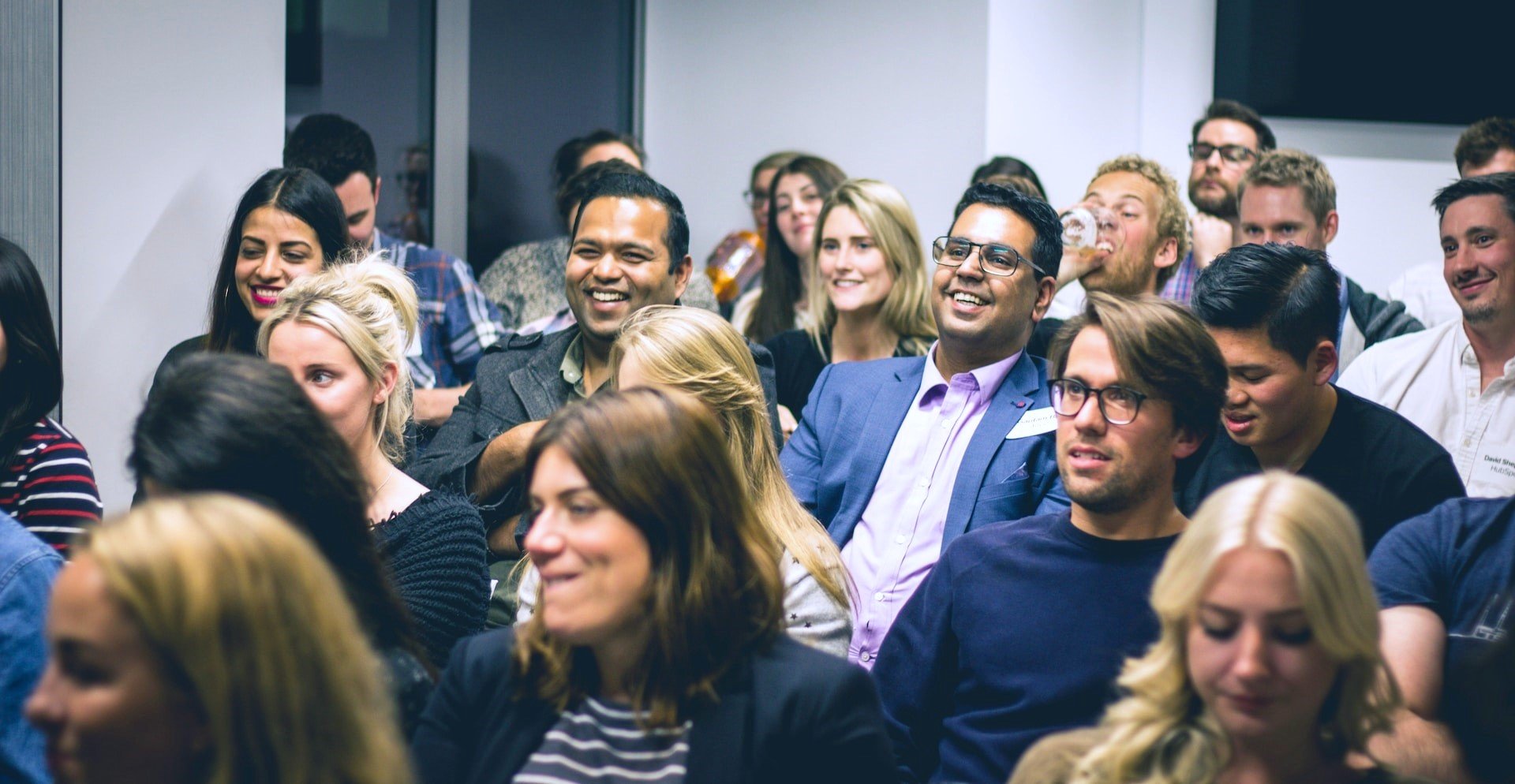 an enthusiastic audience at a lecture